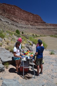 Deer Hill participants eat lunch on the river