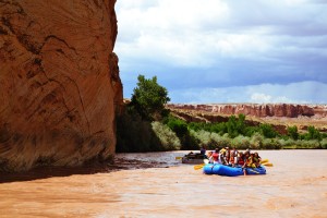 Deer Hill raft floats near a canyon wall