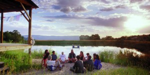 Group holding Circle at pond