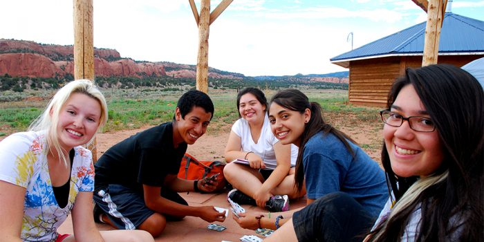 A group relaxing at their service site in Navajo Nation