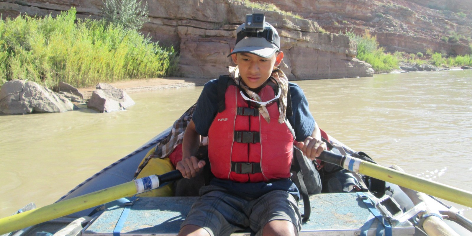 Teen wilderness camp river trip in Utah canyons