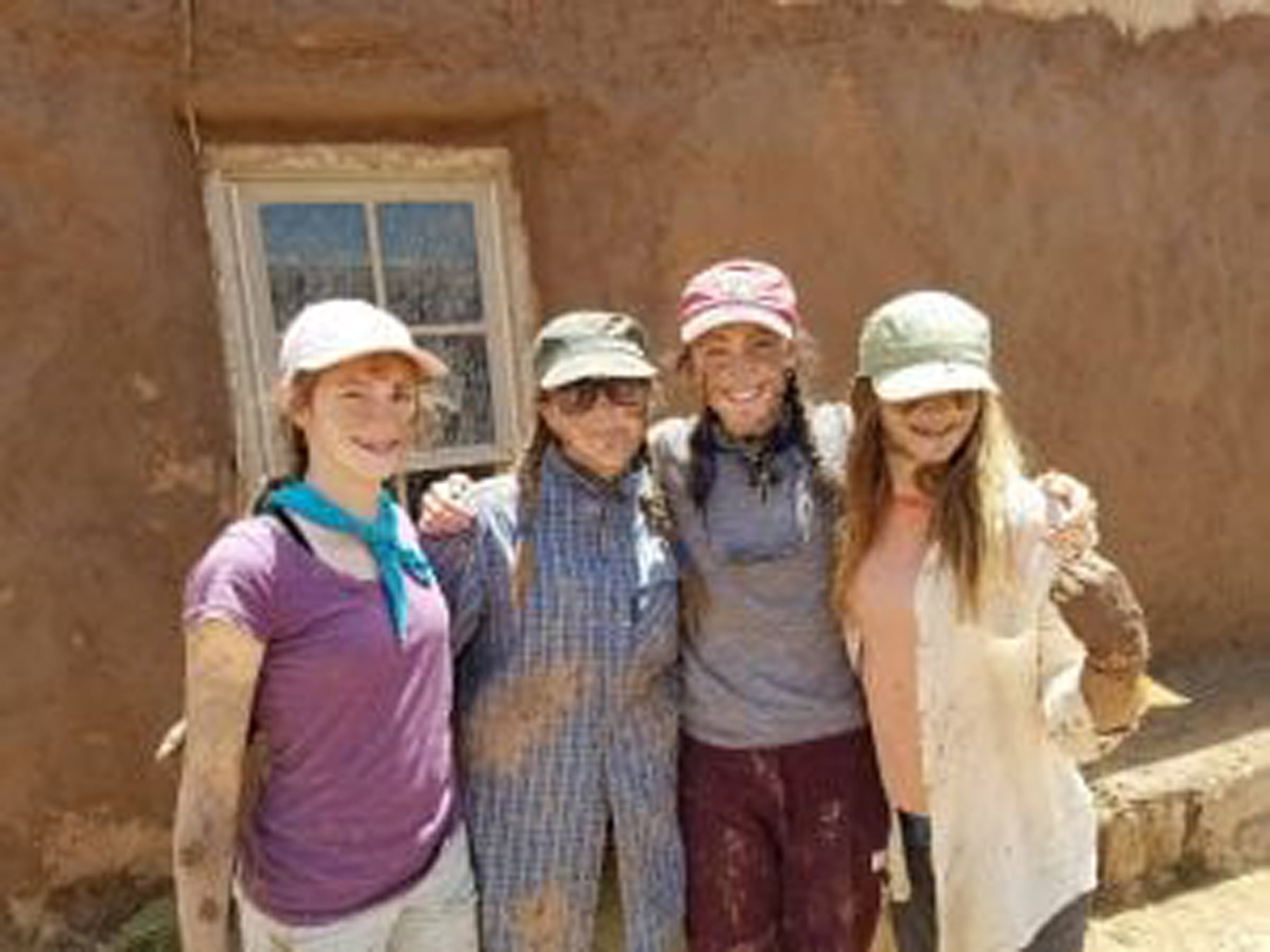 Mud and smiles at Deer Hill service